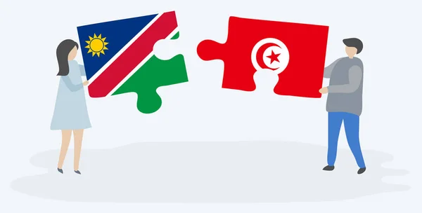 Casal Segurando Duas Peças Quebra Cabeças Com Bandeiras Namíbia Tunísia —  Vetores de Stock