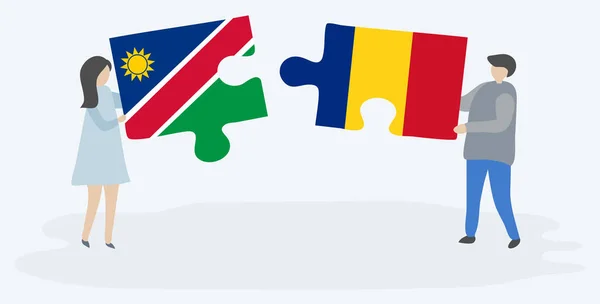 Pareja Sosteniendo Dos Piezas Rompecabezas Con Banderas Namibia Rumanía Namibia — Vector de stock