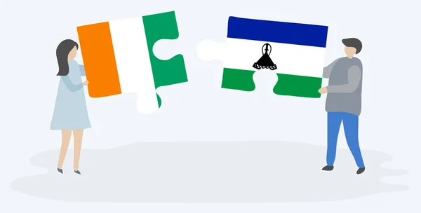 Para Trzyma Dwa Puzzle Kawałki Ivorian Basotho Flagi Wybrzeże Kości — Wektor stockowy