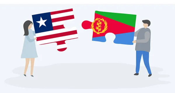 Dvojice Která Držela Dvě Skládanky Liberianským Eritreským Prapory Národní Symboly — Stockový vektor