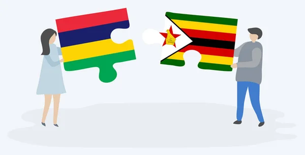 Casal Segurando Duas Peças Quebra Cabeças Com Bandeiras Mauricianas Zimbabuenses — Vetor de Stock