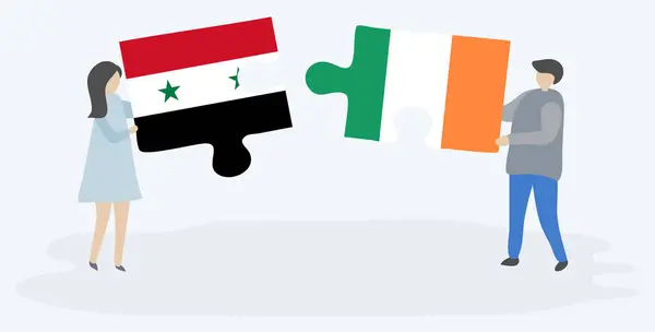 Ζευγάρι Που Κρατά Δύο Κομμάτια Παζλ Συριακές Και Ιρλανδικές Σημαίες — Διανυσματικό Αρχείο