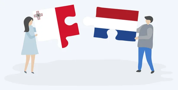 Ζευγάρι Που Κρατά Δύο Κομμάτια Παζλ Μαλτέζικες Και Ολλανδικές Σημαίες — Διανυσματικό Αρχείο