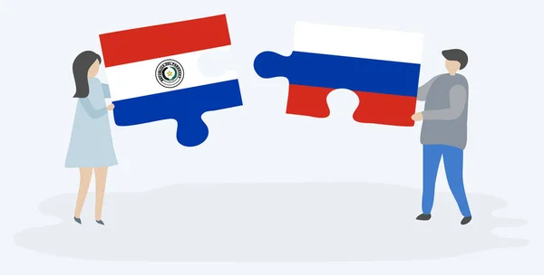 Paraguay Rus Bayrakları Ile Iki Bulmaca Parçaları Tutan Çift Paraguay — Stok Vektör