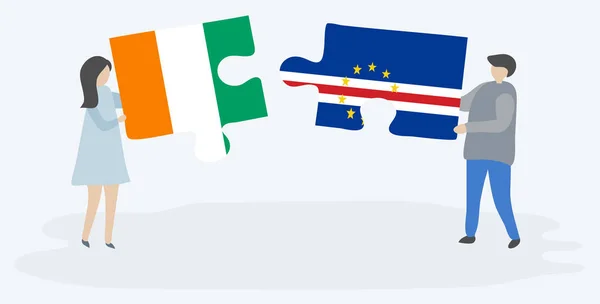 Paar Houden Twee Puzzels Stukken Met Ivoriaanse Cabo Verdean Vlaggen — Stockvector