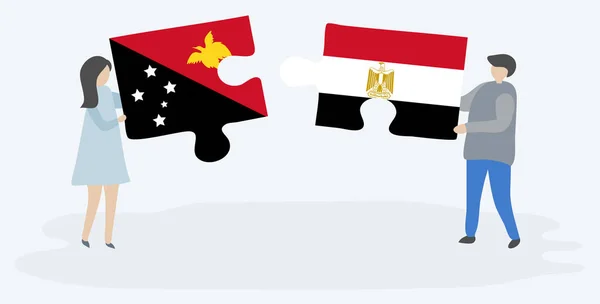 Couple Tenant Deux Pièces Puzzles Avec Des Drapeaux Papous Égyptiens — Image vectorielle