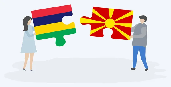 Couple Tenant Deux Pièces Puzzles Avec Des Drapeaux Mauricien Macédonien — Image vectorielle