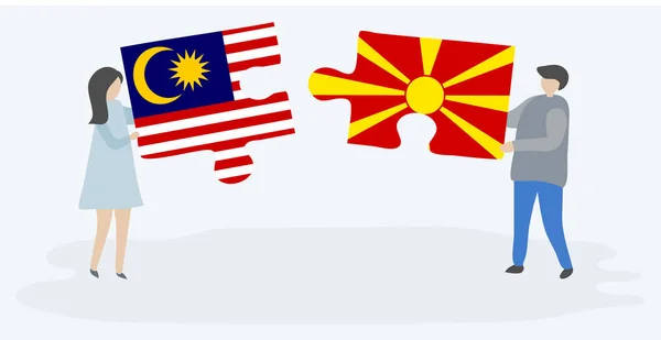 Casal Segurando Duas Peças Quebra Cabeças Com Bandeiras Malásia Macedônia — Vetor de Stock