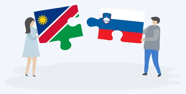 Pareja Sosteniendo Dos Piezas Rompecabezas Con Banderas Namibia Eslovenia Namibia — Vector de stock