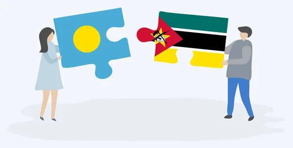 Пара Держащая Две Головоломки Флажками Палау Мозамбика Палау Мозамбик Вместе — стоковый вектор