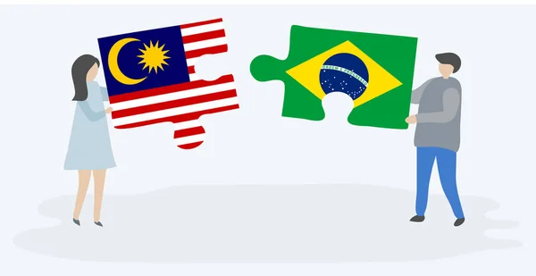 Pareja Sosteniendo Dos Piezas Rompecabezas Con Banderas Malasia Brasil Malasia — Archivo Imágenes Vectoriales