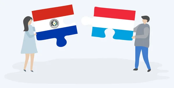 Paar Houden Twee Puzzels Stukken Met Paraguayaanse Luxemburgse Vlaggen Paraguay — Stockvector