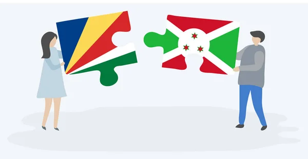 Couple Holding Two Puzzles Pieces Seychellois Burundian Flags Seychelles Burundi — Stock Vector