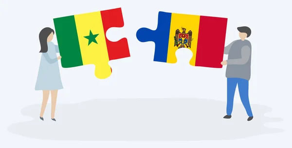 Senegal Moldova Bayrakları Ile Iki Bulmaca Parçaları Tutan Çift Senegal — Stok Vektör