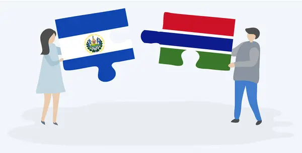 Para Trzyma Dwa Kawałki Puzzli Salwador Gambii Flagi Symbole Narodowe — Wektor stockowy