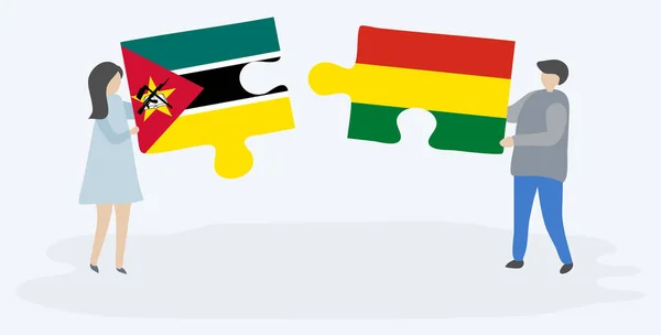 Пара Проведення Двох Головоломок Штук Мозамбіками Болівійські Прапори Мозамбік Болівія — стоковий вектор