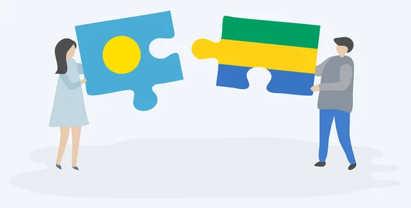 Par Som Innehar Två Pusselbitar Med Palauan Och Gabonese Flaggor — Stock vektor