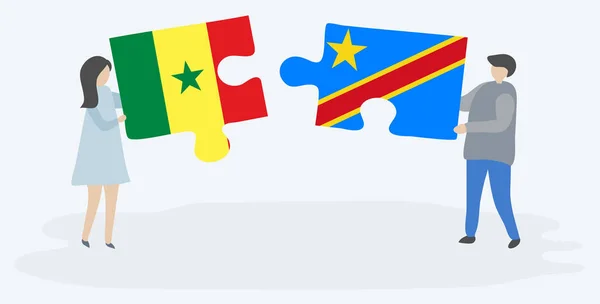 Casal Segurando Duas Peças Quebra Cabeças Com Bandeiras Senegalesas Congolesas — Vetor de Stock