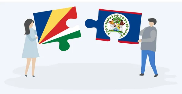Casal Segurando Duas Peças Quebra Cabeças Com Seychellois Bandeiras Belizean — Vetor de Stock