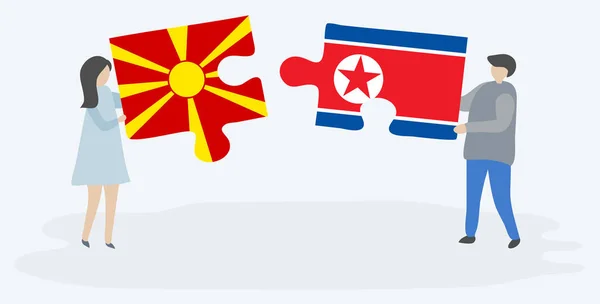 Casal Segurando Duas Peças Quebra Cabeças Com Bandeiras Macedônia Coreia —  Vetores de Stock