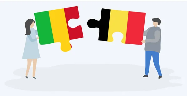 Casal Segurando Duas Peças Quebra Cabeças Com Bandeiras Malianas Belgas — Vetor de Stock