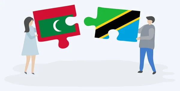 Çift Maldivve Tanzanya Bayrakları Ile Iki Bulmaca Parçaları Tutan Maldivler — Stok Vektör