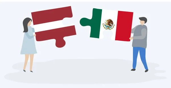 Para Trzyma Dwa Kawałki Puzzli Łotewskich Meksykańskimi Flagami Symbole Narodowe — Wektor stockowy