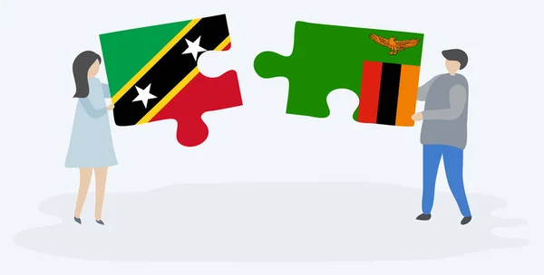 一对夫妇拿着两块拼图 上面挂着基蒂蒂安和赞比亚国旗 圣基茨和尼维斯和赞比亚国家符号在一起 — 图库矢量图片