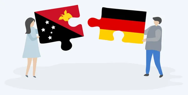 Paar Houden Twee Puzzels Stukken Met Papuan Duitse Vlaggen Nationale — Stockvector
