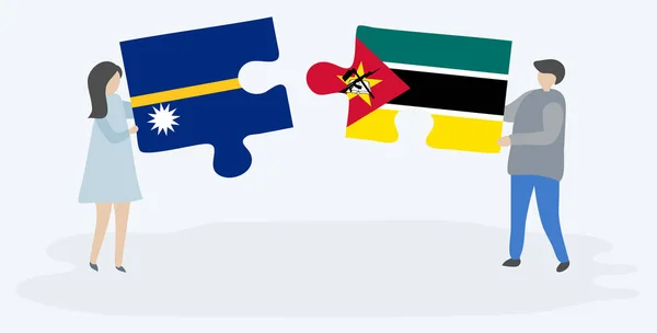 一对夫妇拿着两块拼图 上面挂着瑙鲁和莫桑比克国旗 瑙鲁和莫桑比克国家符号在一起 — 图库矢量图片