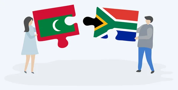 Pareja Sosteniendo Dos Piezas Rompecabezas Con Banderas Maldivas Sudáfrica Maldivas — Vector de stock