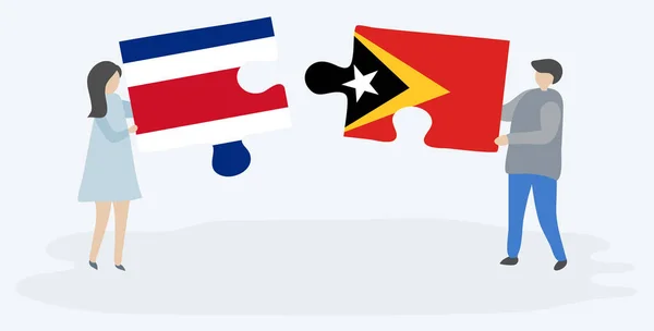 Paar Houden Twee Puzzels Stukken Met Costa Ricaanse Timorese Vlaggen — Stockvector