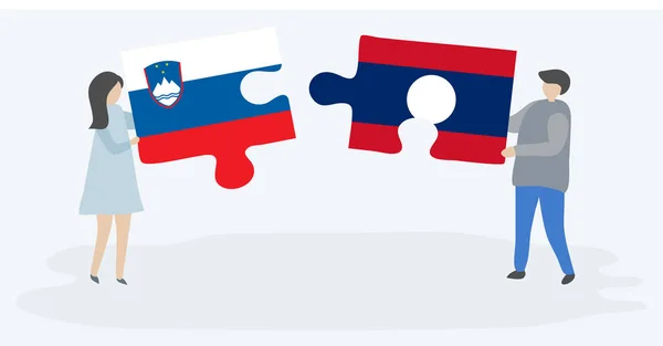 Couple Holding Two Puzzles Pieces Slovenian Lao Flags Slovenia Laos — Stock Vector