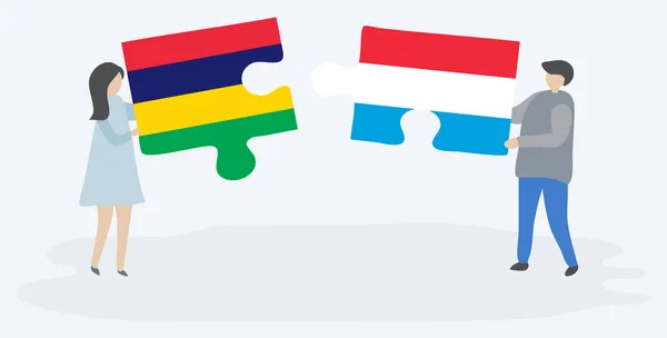 Casal Segurando Duas Peças Quebra Cabeças Com Bandeiras Maurícias Luxemburguesas —  Vetores de Stock