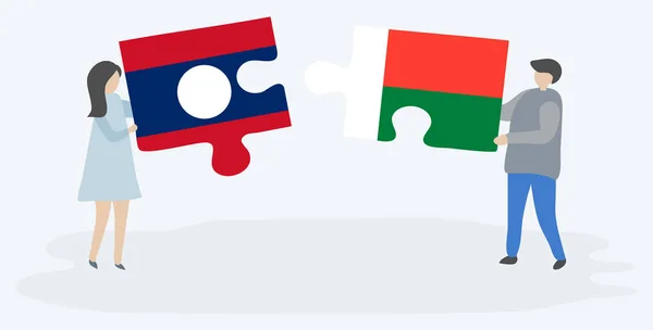 Ζευγάρι Που Κρατά Δύο Κομμάτια Παζλ Λαοτινά Και Μαδαγασκάρης Σημαίες — Διανυσματικό Αρχείο