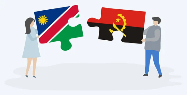 Pareja Sosteniendo Dos Piezas Rompecabezas Con Banderas Namibia Angola Namibia — Vector de stock