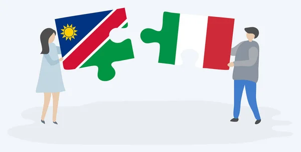 Pareja Sosteniendo Dos Piezas Rompecabezas Con Banderas Namibia Italia Namibia — Vector de stock