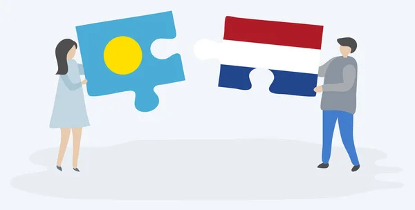 Néhány Holding Két Rejtvények Darab Palauan Holland Zászlók Palau Holland — Stock Vector