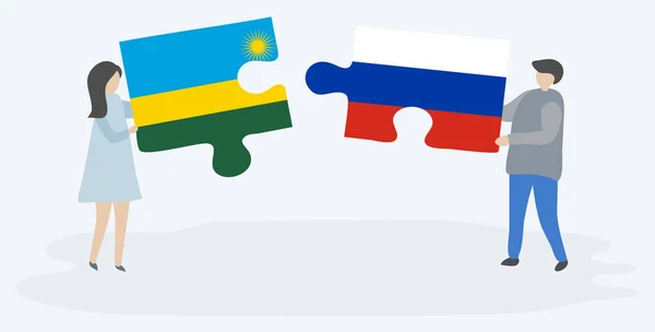 Paar Houden Twee Puzzels Stukken Met Rwankaanse Russische Vlaggen Rwanda — Stockvector
