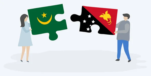 Pareja Sosteniendo Dos Piezas Rompecabezas Con Banderas Mauritania Papúa Mauritania — Vector de stock