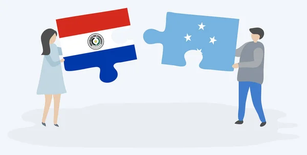 Pareja Sosteniendo Dos Piezas Rompecabezas Con Banderas Paraguayas Micronesianas Paraguay — Archivo Imágenes Vectoriales