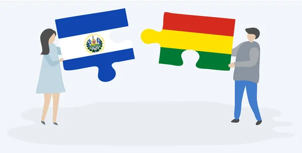 Para Trzyma Dwa Kawałki Puzzli Salwadoru Boliwijskich Flag Salwador Boliwia — Wektor stockowy