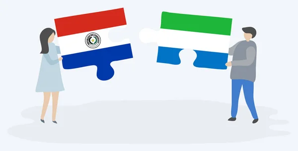 Paar Houden Twee Puzzels Stukken Met Paraguayaanse Sierra Leonean Vlaggen — Stockvector
