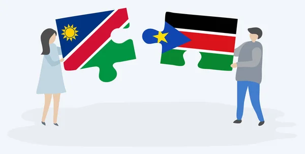 Casal Segurando Duas Peças Quebra Cabeças Com Bandeiras Namíbia Sudão — Vetor de Stock