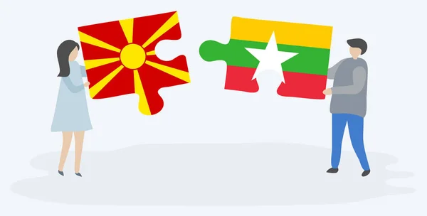 Casal Segurando Duas Peças Quebra Cabeças Com Bandeiras Macedônia Birmanesa —  Vetores de Stock