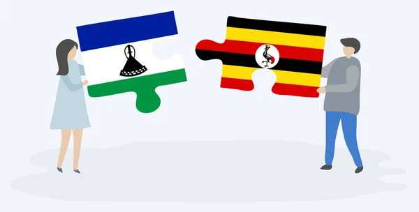 Para Trzyma Dwa Puzzle Kawałki Basotho Ugandy Flagi Symbole Narodowe — Wektor stockowy