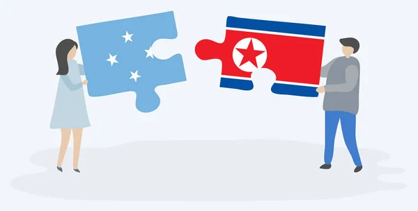 Mikronezya Kuzey Kore Bayrakları Ile Iki Bulmaca Parçaları Tutan Çift — Stok Vektör