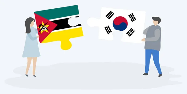Пара Держащая Две Головоломки Мозамбикским Южнокорейским Флагами Государственные Символы Мозамбика — стоковый вектор