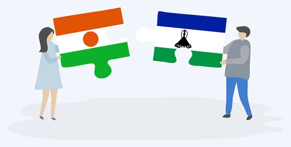 Dvojice Dvěma Skládankami Vlajkou Nigerien Basotho Národní Symboly Niger Lesotho — Stockový vektor