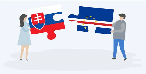 夫妇拿着两个拼图片与斯洛伐克和佛得角国旗 斯洛伐克和佛得角国家符号在一起 — 图库矢量图片